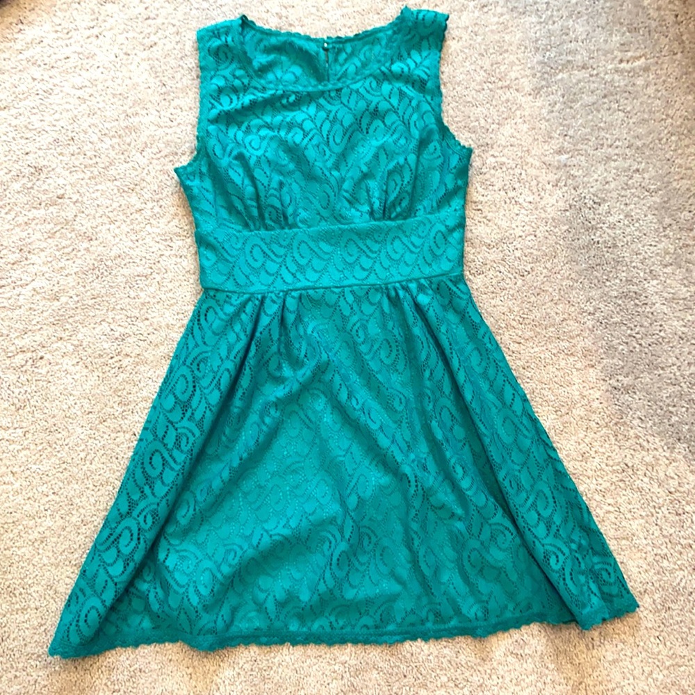 Teal/green lace dress. Lace is see through at neckline size 9/10
